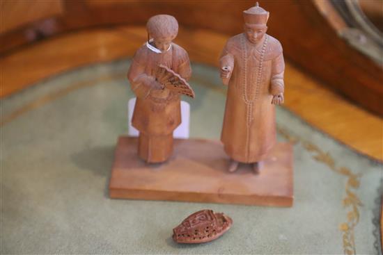 Two Chinese silver models of sedan chairs by Wang Hing, two Chinese wood figures, a pewter cup etc.